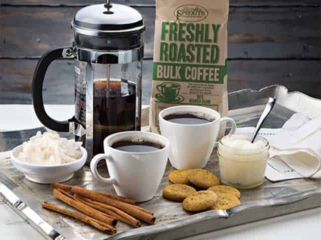 Coffee with cookies and cinnamon sticks