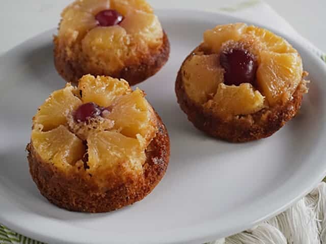 Three Upside Down Pineapple Cakes on plate