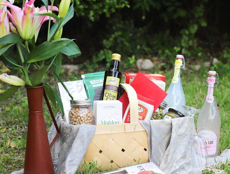 Basket with various cooking and gourmet items 