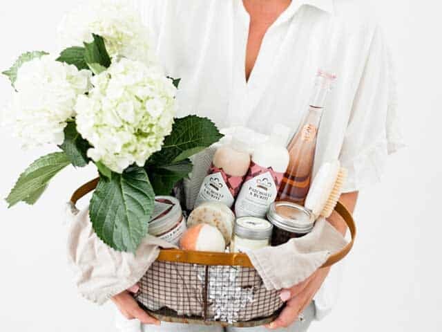 Woman holding gift basket