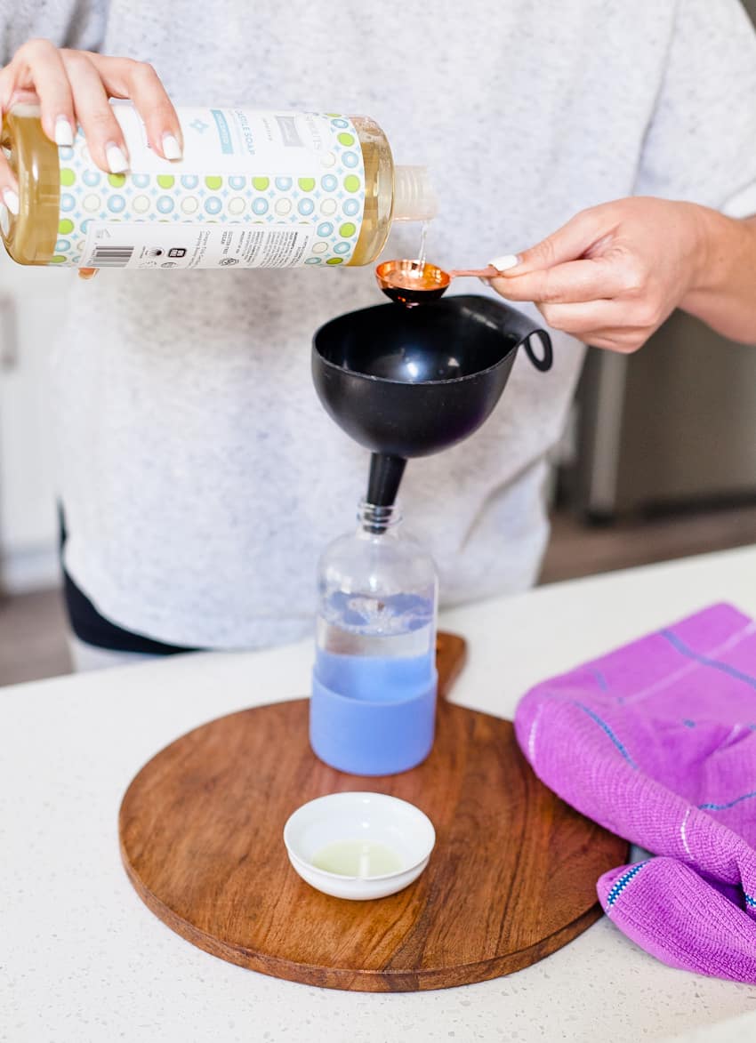 Pouring Castile Soap into Bottle