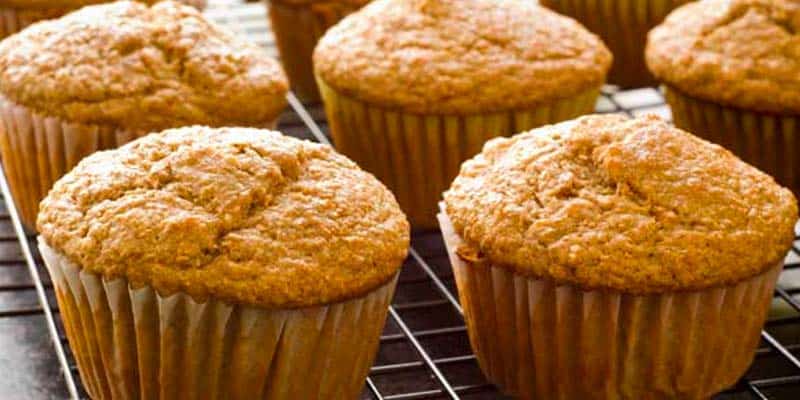 peanut butter muffins on a cooling rack