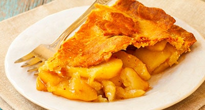 slice of apple pie on a plate