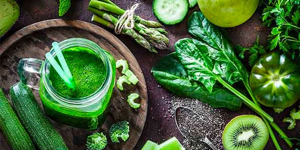 green fruits and vegetables on a tabletop