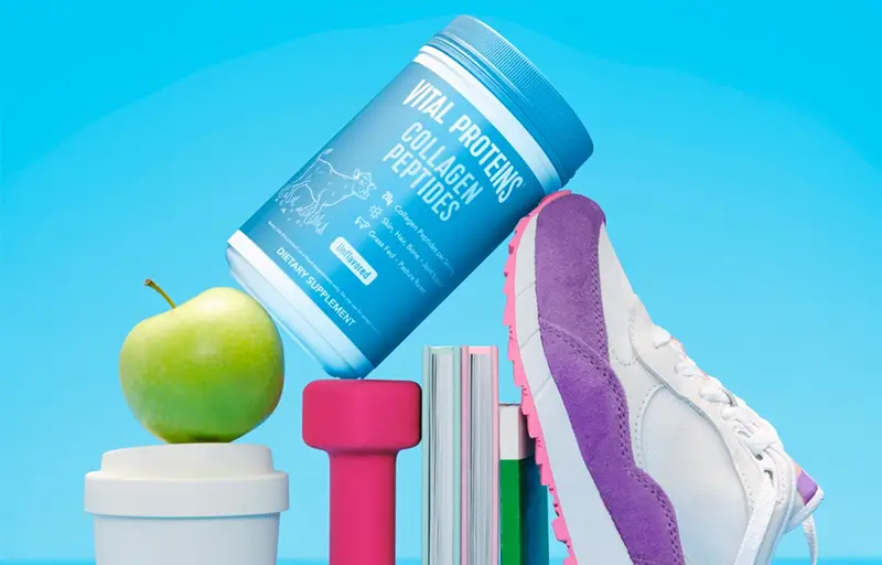 Collagen Peptides balanced on exercise gear.