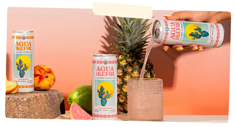 Aqua de Kefir surrounded by fruits