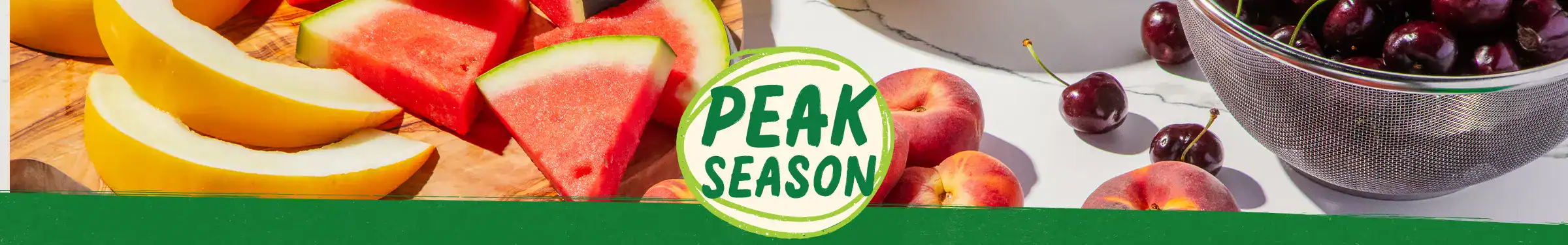 Peak Season Produce logo surrounded by produce