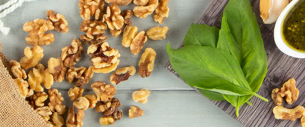 Walnuts spilled onto a tabletop