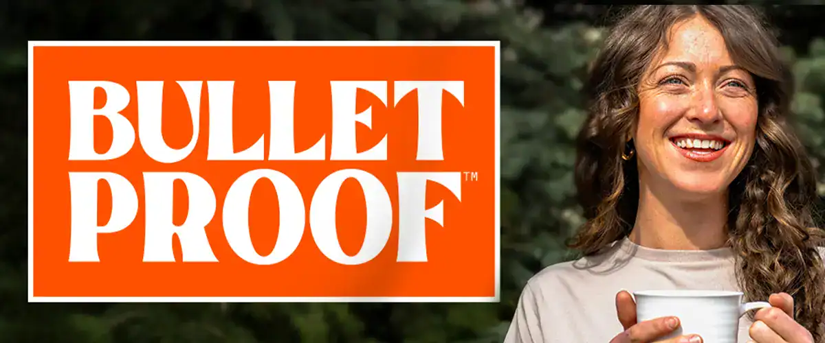 BulletProof logo next to girl drinking coffee