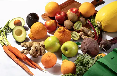 Peak Season logo surrounded by produce